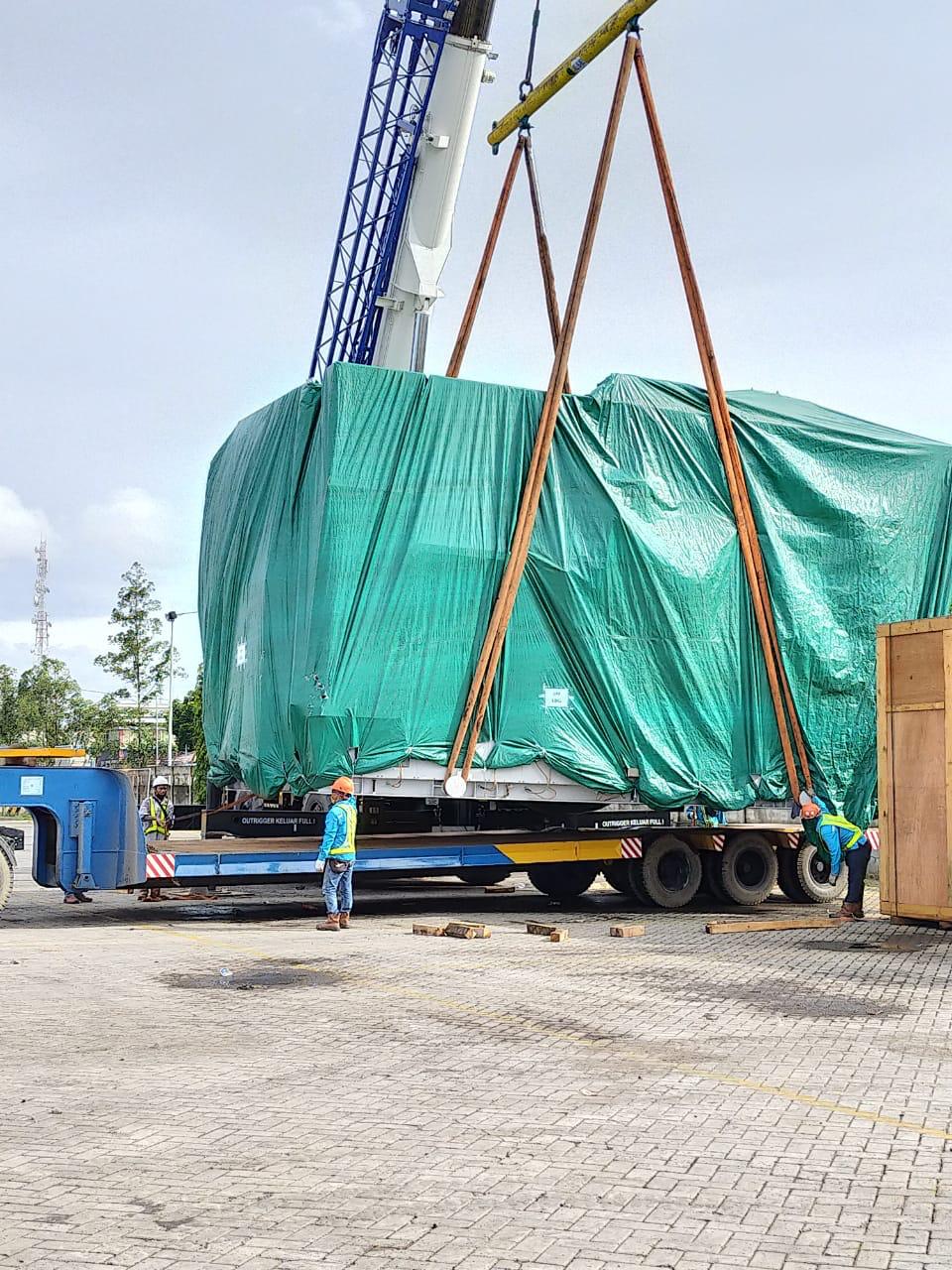 PAL green tarpaulin cargo transport on trailer